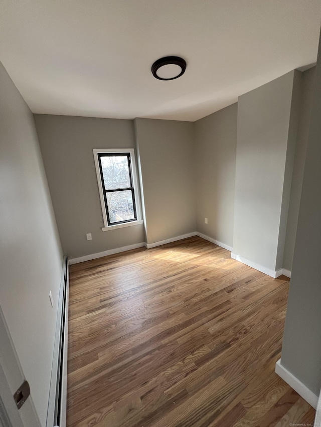 49 Hill St, Waterbury, CT 06704 - spare room with wood finished floors and baseboards