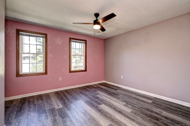 37 White Tail Ln Unit 37, Wallingford, CT 06492 - unfurnished room with dark wood-style flooring, ceiling fan, baseboards, and a textured ceiling