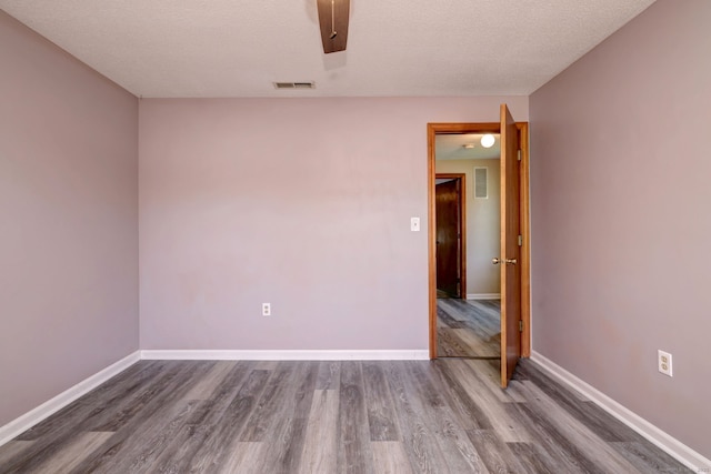37 White Tail Ln Unit 37, Wallingford, CT 06492 - empty room featuring wood finished floors and baseboards