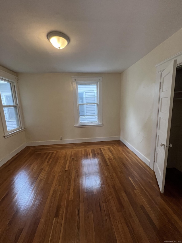 865 Elm St, New Haven, CT 06511 - spare room featuring wood finished floors and baseboards