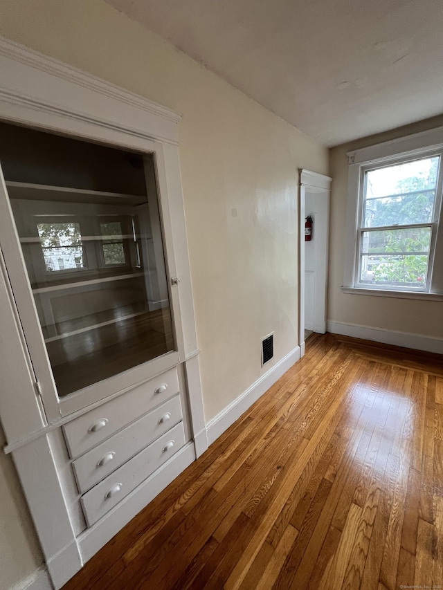 865 Elm St, New Haven, CT 06511 - empty room with wood-type flooring and baseboards