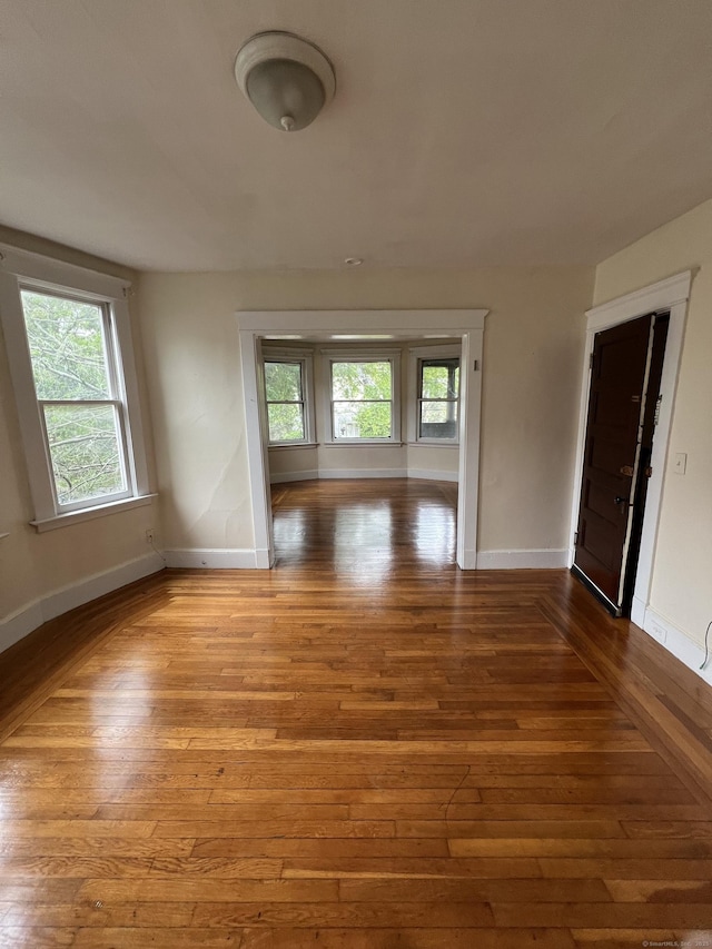 865 Elm St, New Haven, CT 06511 - empty room featuring plenty of natural light and hardwood / wood-style floors