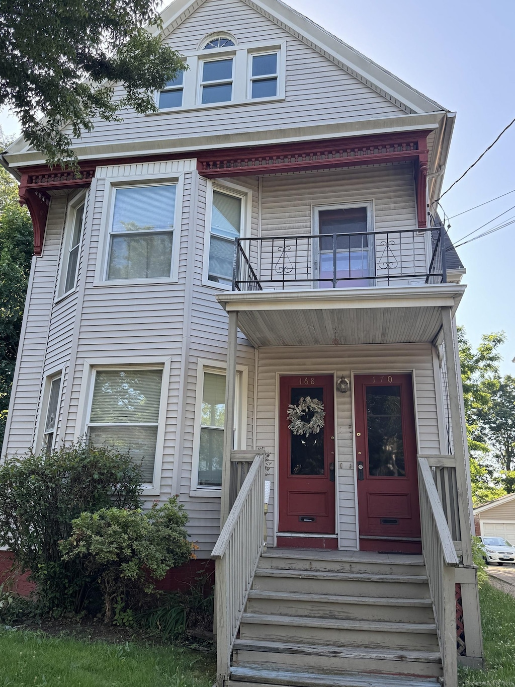 168 Ellsworth Ave, New Haven, CT 06511 - victorian house featuring a balcony and covered porch