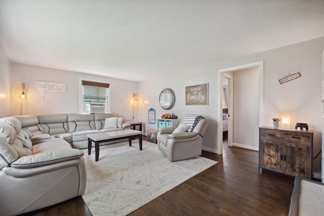 29 Carson Ave, Wethersfield, CT 06109 - living room with dark wood-style flooring and baseboards