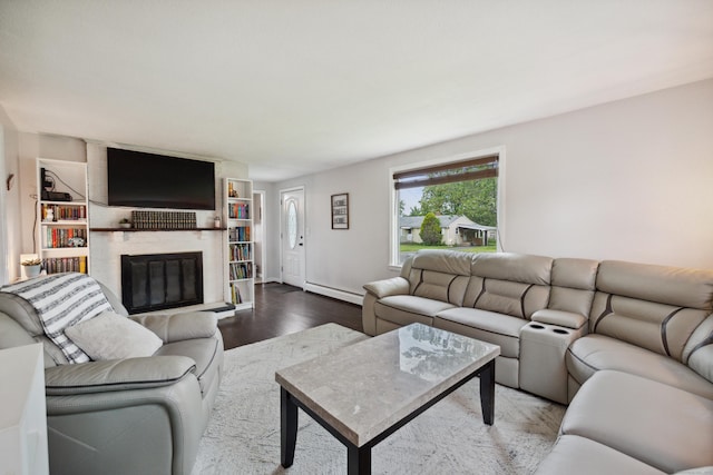29 Carson Ave, Wethersfield, CT 06109 - living room with a baseboard heating unit, a fireplace, and wood finished floors