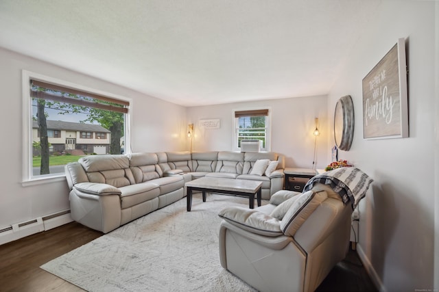 29 Carson Ave, Wethersfield, CT 06109 - living area featuring baseboard heating and wood finished floors