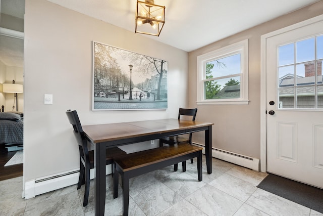 29 Carson Ave, Wethersfield, CT 06109 - dining area with a chandelier and a baseboard heating unit