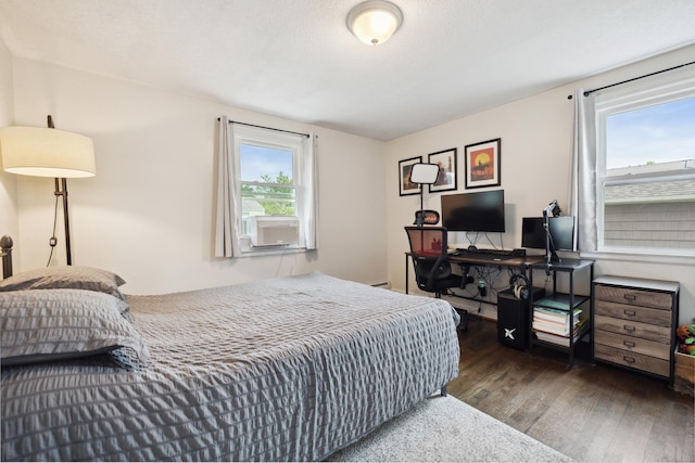 29 Carson Ave, Wethersfield, CT 06109 - bedroom featuring wood finished floors, multiple windows, and cooling unit