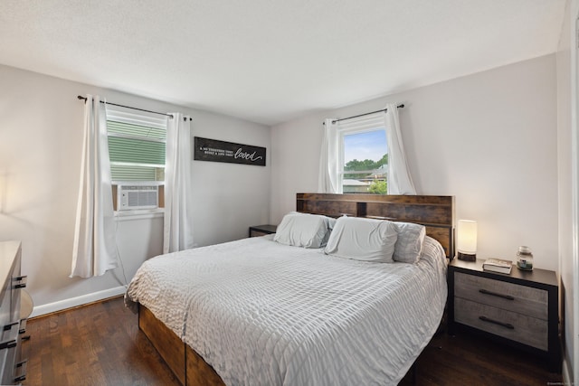 29 Carson Ave, Wethersfield, CT 06109 - bedroom with dark wood-style flooring, cooling unit, and baseboards