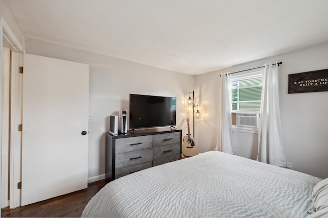 29 Carson Ave, Wethersfield, CT 06109 - bedroom featuring dark wood-type flooring, cooling unit, and baseboards