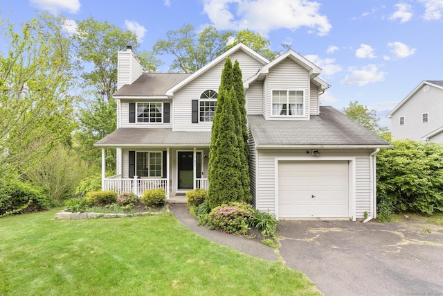 167 Santa Maria Dr, Torrington, CT 06790 - traditional home with a chimney, covered porch, a front lawn, a garage, and asphalt driveway