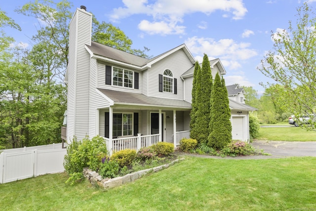 167 Santa Maria Dr, Torrington, CT 06790 - traditional home featuring covered porch, a chimney, asphalt driveway, and a garage