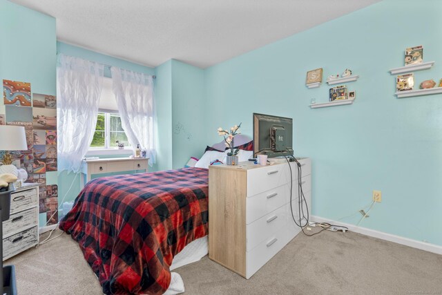 167 Santa Maria Dr, Torrington, CT 06790 - bedroom featuring light colored carpet and baseboards