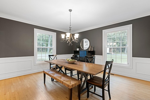 27 Chiltern St, Farmington, CT 06032 - dining room with a chandelier, a wainscoted wall, light wood-style flooring, and ornamental molding