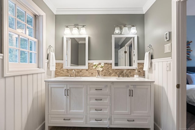 27 Chiltern St, Farmington, CT 06032 - bathroom featuring ensuite bath, double vanity, crown molding, and a wainscoted wall