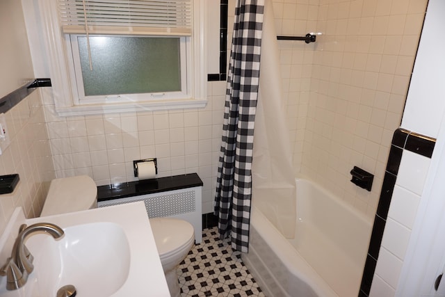 5 Chappell St, Chaplin, CT 06235 - full bathroom with toilet, tile walls, a sink, shower / bath combination with curtain, and tile patterned flooring