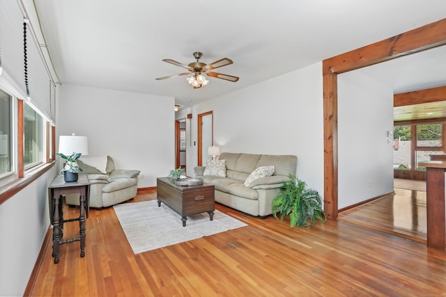 309 Marlborough Ter, Fairfield, CT 06825 - living room with wood finished floors, a ceiling fan, and baseboards