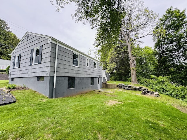 10 Bozrah St, Bozrah, CT 06334 - back of property featuring a lawn