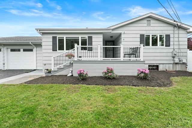 6 Meadow Dr, Waterford, CT 06385 - ranch-style home featuring a front lawn, a garage, covered porch, and asphalt driveway