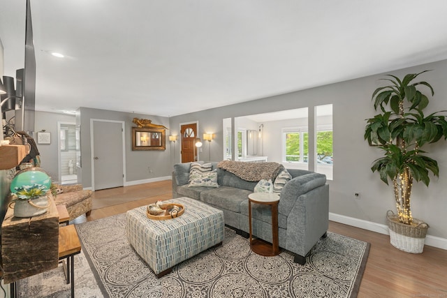 6 Meadow Dr, Waterford, CT 06385 - living area with wood finished floors and baseboards