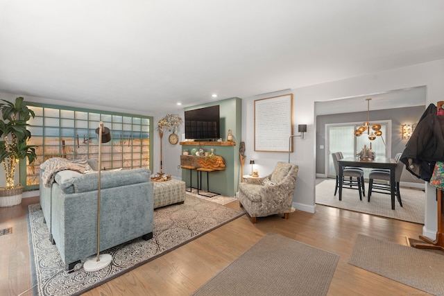 6 Meadow Dr, Waterford, CT 06385 - living area with wood finished floors, a chandelier, baseboards, and recessed lighting