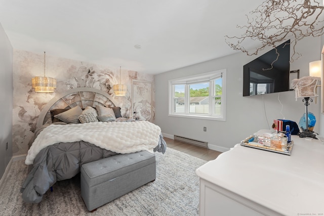 6 Meadow Dr, Waterford, CT 06385 - bedroom with a baseboard radiator, light wood finished floors, and baseboards