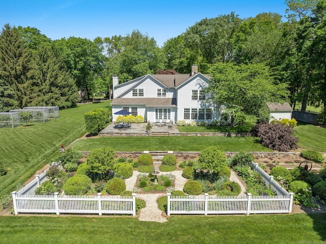 145 Seir Hill Rd, Wilton, CT 06897 - back of property featuring a chimney and a patio area