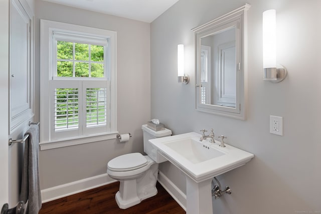 145 Seir Hill Rd, Wilton, CT 06897 - bathroom featuring wood finished floors, baseboards, toilet, and a sink