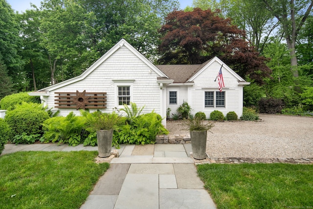 145 Seir Hill Rd, Wilton, CT 06897 - view of front of home featuring a front lawn and view of wooded area