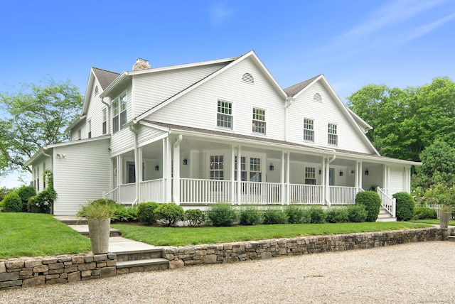 145 Seir Hill Rd, Wilton, CT 06897 - view of front of home featuring covered porch, a chimney, and a front yard