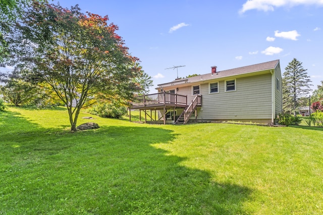 5 Settlers Ln, Newtown, CT 06482 - rear view of property featuring a deck, stairs, a lawn, and a chimney