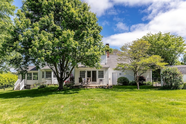 16 Botsford Rd, Kent, CT 06757 - rear view of house featuring a lawn, a chimney, a patio, and roof with shingles