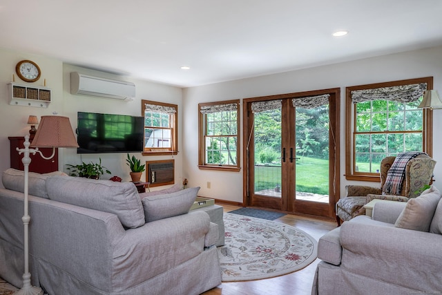 16 Botsford Rd, Kent, CT 06757 - living room featuring a wall mounted air conditioner, french doors, wood finished floors, recessed lighting, and baseboards