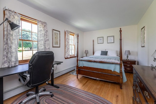 16 Botsford Rd, Kent, CT 06757 - bedroom with light wood-type flooring, baseboard heating, multiple windows, and a desk