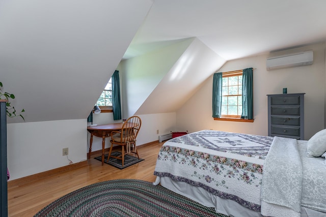 16 Botsford Rd, Kent, CT 06757 - bedroom with a wall unit AC, wood finished floors, multiple windows, lofted ceiling, and baseboards