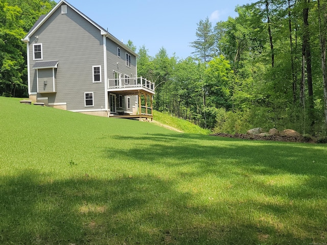 82 Ladd Rd, Tolland, CT 06084 - back of property with a lawn and a deck