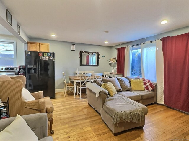 1 N Taylor Ave, Norwalk, CT 06854 - living room with light wood finished floors, plenty of natural light, and recessed lighting