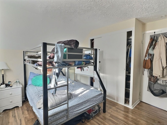 1 N Taylor Ave, Norwalk, CT 06854 - bedroom featuring wood finished floors and a textured ceiling