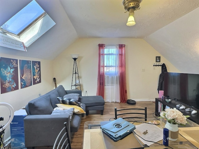 1 N Taylor Ave, Norwalk, CT 06854 - living area with lofted ceiling, wood finished floors, and a skylight