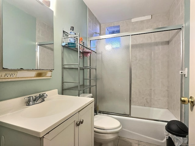 1 N Taylor Ave, Norwalk, CT 06854 - bathroom with toilet, vanity, bath / shower combo with glass door, and tile patterned floors