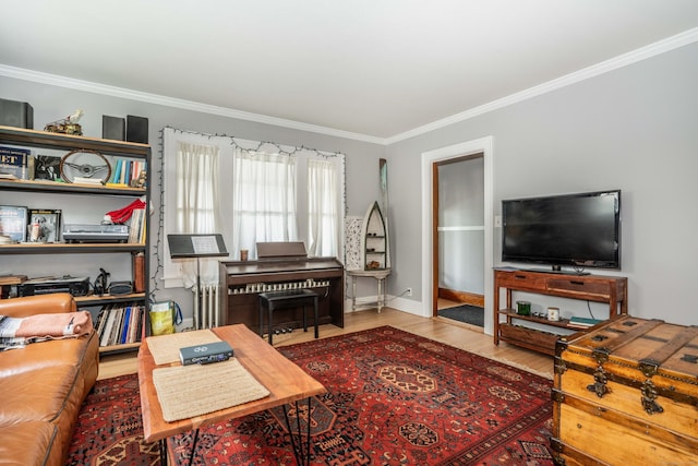 5 Seymour Ave, West Hartford, CT 06119 - living area with crown molding, wood finished floors, radiator heating unit, and baseboards