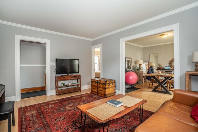 5 Seymour Ave, West Hartford, CT 06119 - living room with wood finished floors, ornamental molding, and baseboards