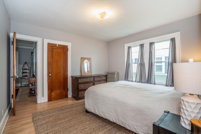 5 Seymour Ave, West Hartford, CT 06119 - bedroom featuring light wood-style flooring, radiator heating unit, and baseboards