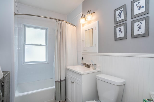 5 Seymour Ave, West Hartford, CT 06119 - full bath featuring vanity, toilet, shower / bath combo with shower curtain, and a wainscoted wall