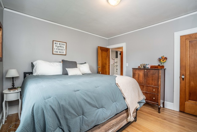 5 Seymour Ave, West Hartford, CT 06119 - bedroom with ornamental molding, light wood-style floors, and baseboards