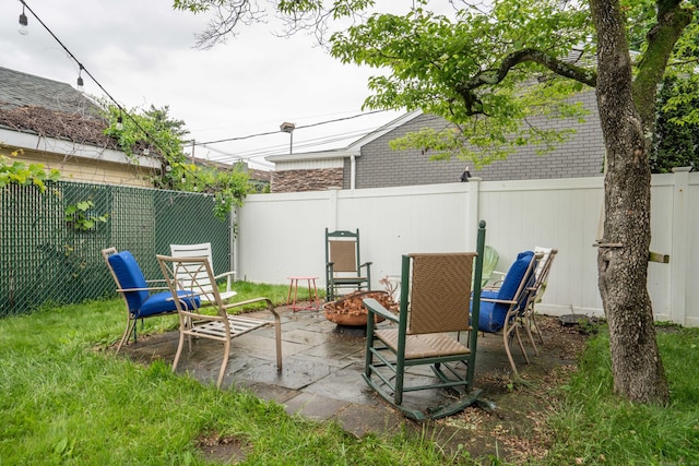 5 Seymour Ave, West Hartford, CT 06119 - fenced backyard featuring a patio area