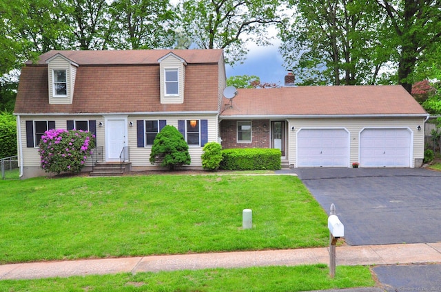 24 Jennifer Rd, Bristol, CT 06010 - dutch colonial featuring an attached garage, asphalt driveway, a front yard, and a chimney