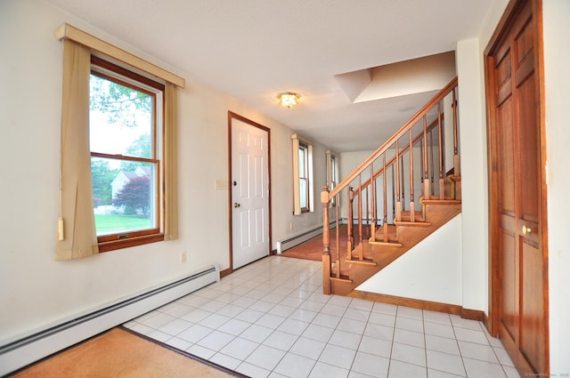 24 Jennifer Rd, Bristol, CT 06010 - foyer with baseboard heating, stairway, and baseboards