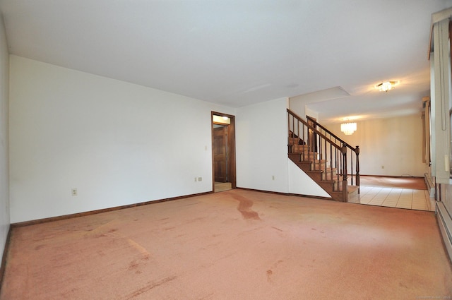 24 Jennifer Rd, Bristol, CT 06010 - unfurnished living room with stairs, carpet flooring, and baseboards