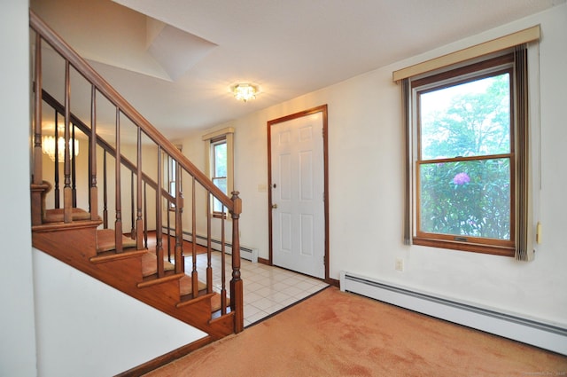 24 Jennifer Rd, Bristol, CT 06010 - carpeted entryway with a baseboard heating unit and stairway